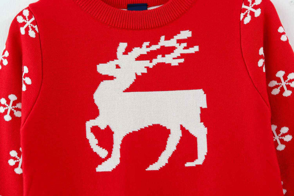 Details - Elk motif in center of garment